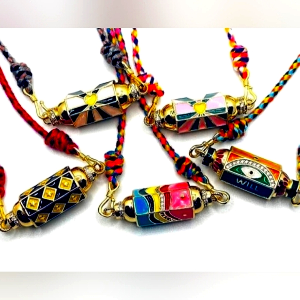 One Necklace on multicolored silk cord With Freshwater Pearls.